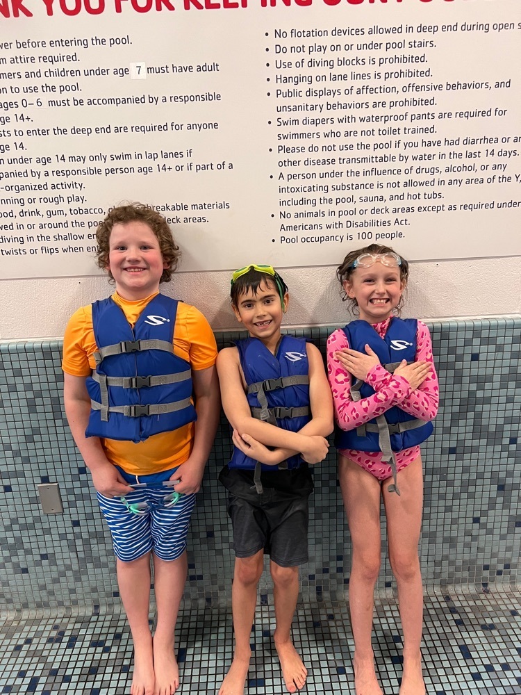 Roark, Ashton and Caitlin after tipping in the canoe.
