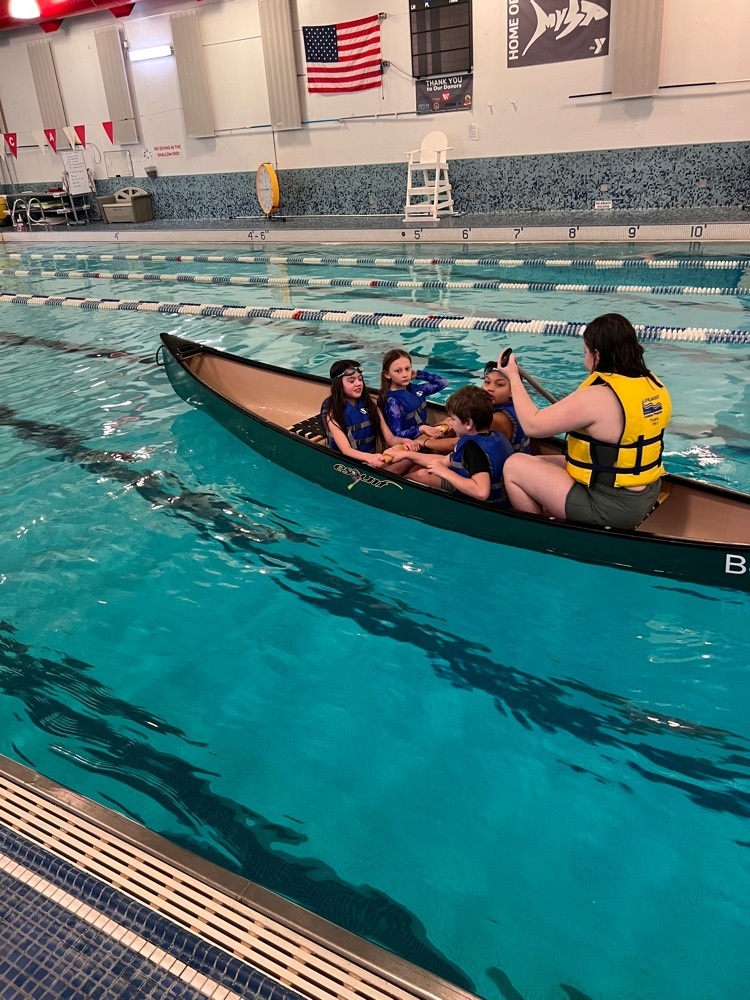 3rd grader going for a ride in the Canoe.
